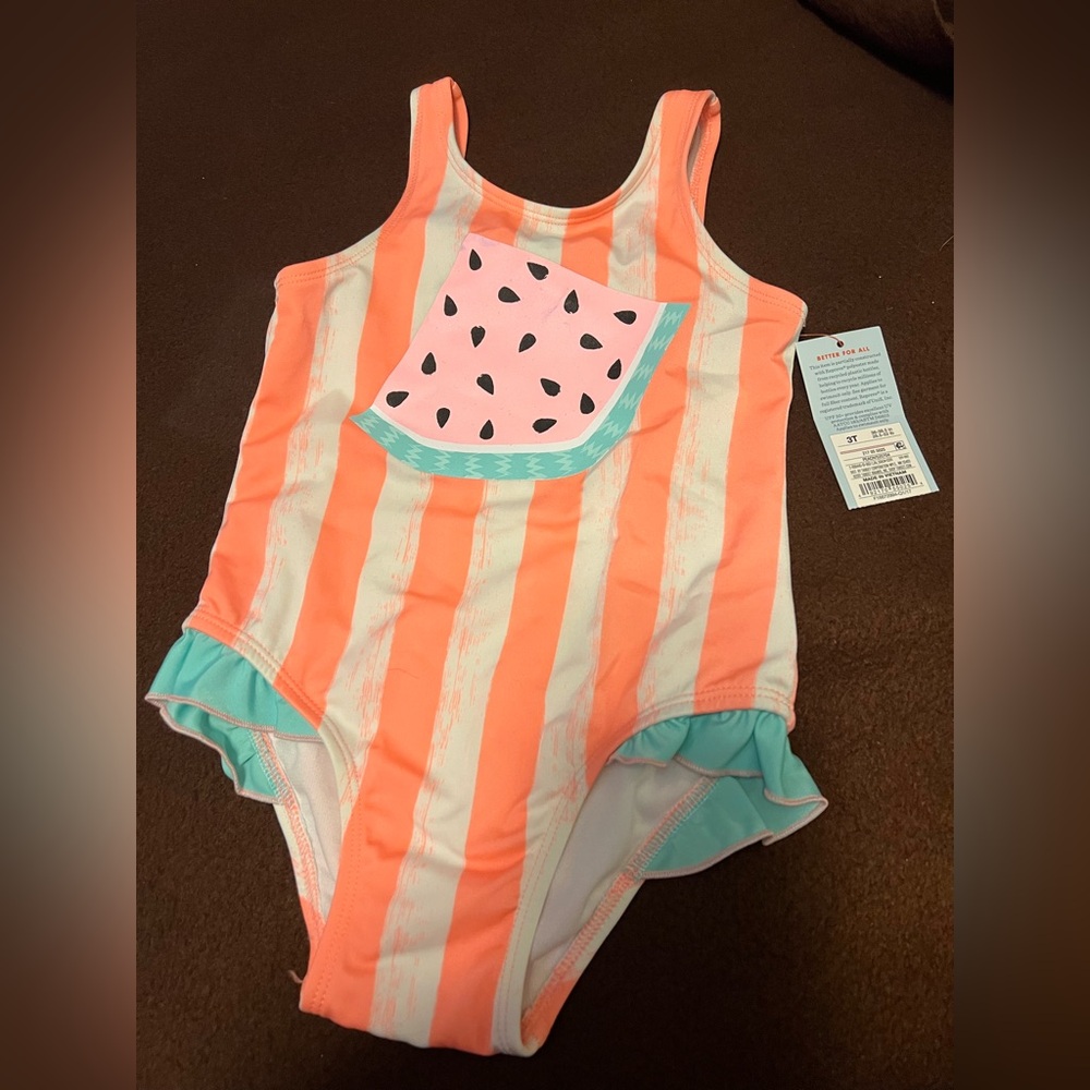 Striped Orange and White Swimsuit with Pink Pocket
Size 3T new!